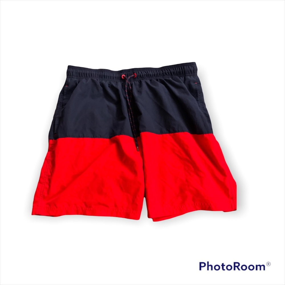 Navy blue and red swimming trunks
